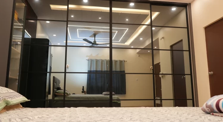 Modern bedroom by interior design firms in JP Nagar with smart storage.