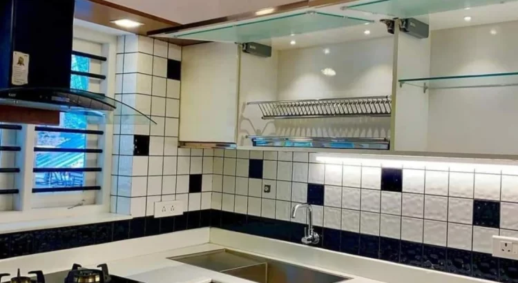 Home Interior designers in Rajarajeshwari Nagar designing a modern modular kitchen.
