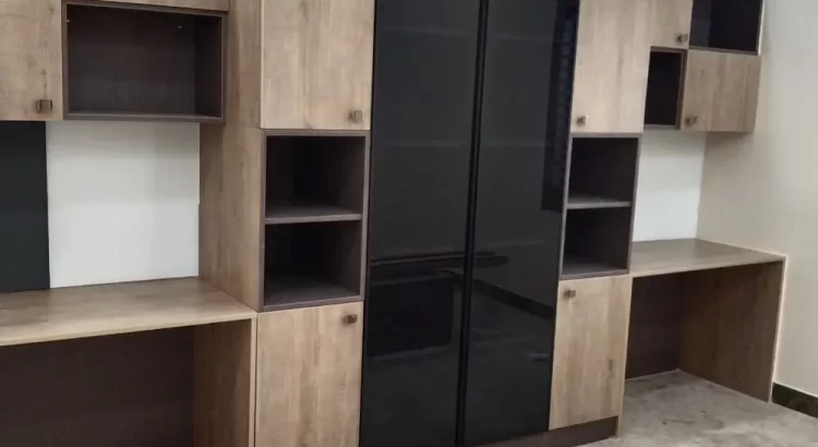 Modern custom wardrobe and study unit by Interior Designing Company in Rajarajeshwari Nagar